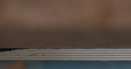 closeup of painted black plywoodの写真素材