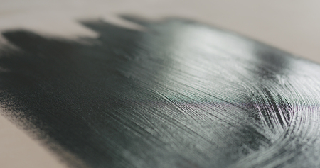 closeup of painted black plywood, wide photo