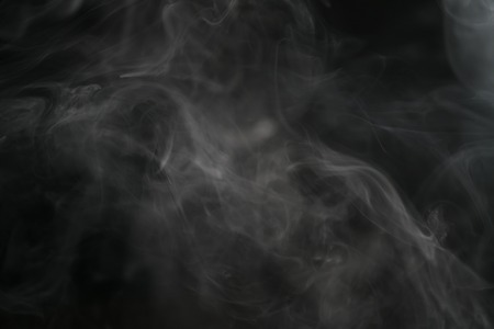 closeup abstract vapor over black background for backdrop or overlay, shallow focus