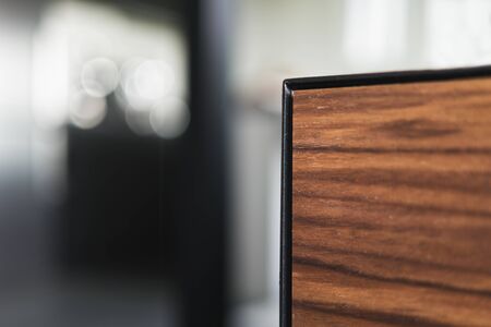 Closeup details of modern tv stand made from walnut and powder coated steedの写真素材