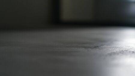 Closeup background of decorative plaster surface for product placementの写真素材