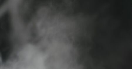 water mist over black backgroundの写真素材