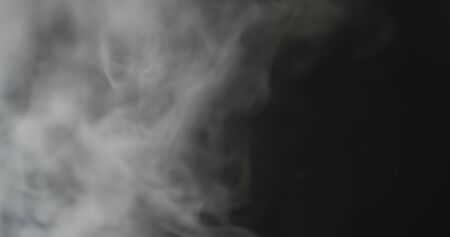 water mist over black backgroundの写真素材