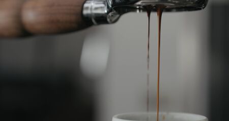 closeup of espresso extraction with bottomless portafilterの写真素材