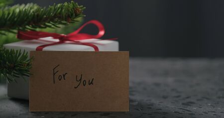 for you paper card next to gift box, wide photo