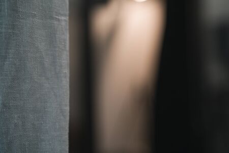 Closeup of linen curtains on a window, shallow focus