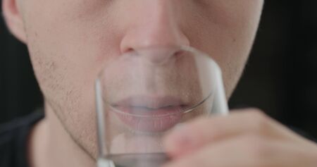 closeup shot of man taking pillの写真素材