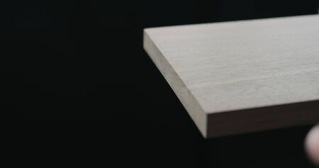 untreated walnut board closeup in workshop, wide photo