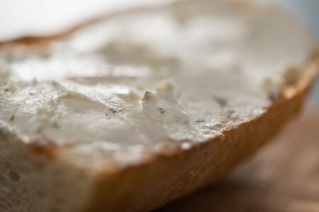 Closeup ciabatta with cream cheese, shallow focus,