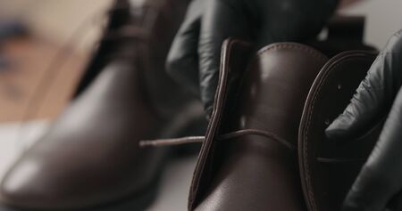 remove laces from chukka boots before maintenance, wide photo