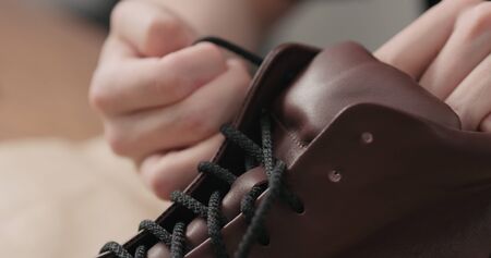 remove laces from sneakers before maintenance, wide photo