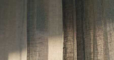closeup of linen transparent curtains with sunset light, wide photo