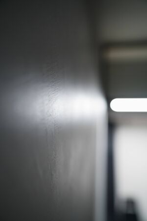closeup wall with light stripe on a background , shallow focusの写真素材