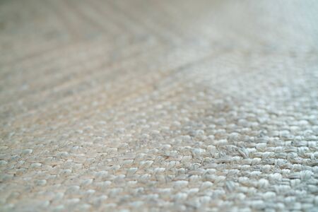 pale jute floor rag background closeup, good for background