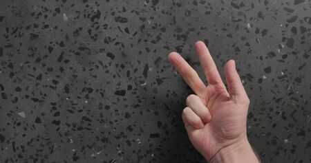 top view man hand count over concrete background, wide photo
