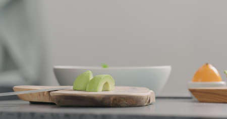 ripe avocado on kitchen countertop side view