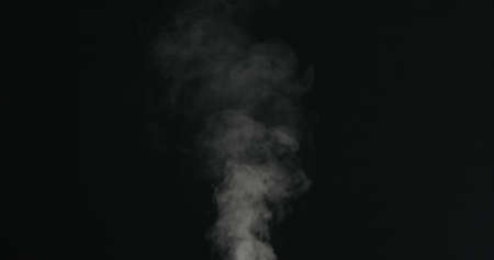 water mist stream over black backgroundの写真素材