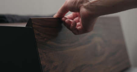 man hand check walnut wood breadboxの写真素材
