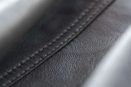 Closeup full grain gray brown leather clothes background