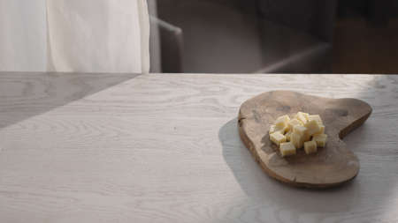 Vintage cheese on olive wood board