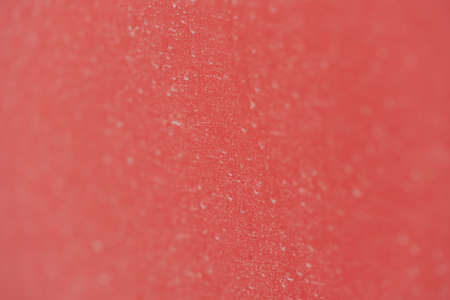 detail shot of red car with road dust and dirt