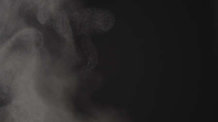 Steam rising over black backgroundの写真素材