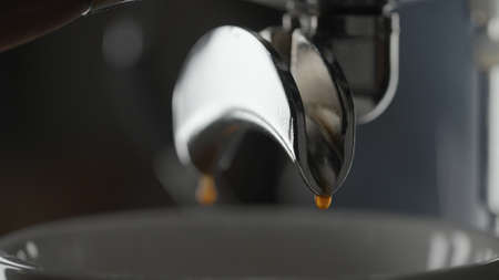 pour double espresso with professional coffee machineの写真素材