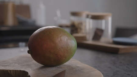 fresh mango on wood boardの写真素材