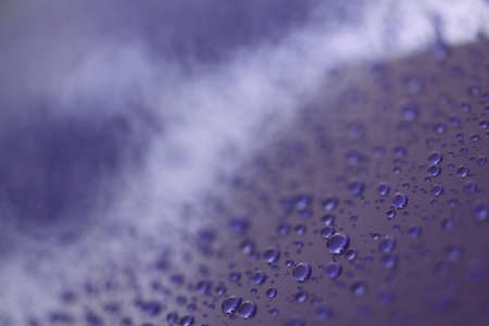 Water drops on a hydrophobic car paint surfaceの写真素材