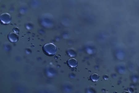 Water drops on a hydrophobic car paint surface