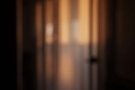 Blurred background of dining room with natural light from a windowの写真素材