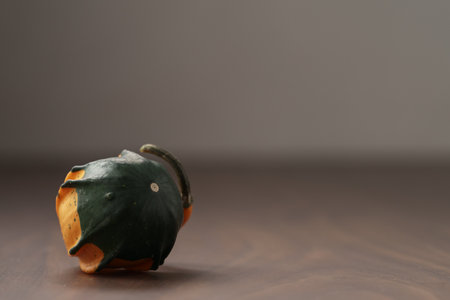 Decorative small pumpkin on wood tableの写真素材