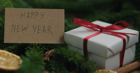 Closeup white gift box with happy new year card