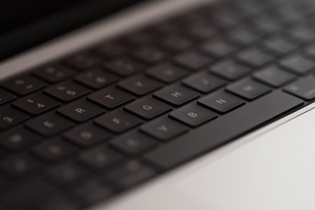 Saint-Petersburg, Russia - Circa December, 2022: closeup of new macbook pro 14 inch keyboard