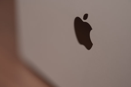 Saint-Petersburg, Russia - Circa December, 2022: open apple macbook pro 14 inch on walnut tableのeditorial素材