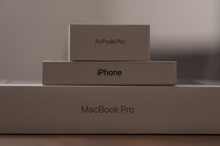 Saint-Petersburg, Russia - Circa December, 2022: Apple devices boxes stacked on wood tableのeditorial素材