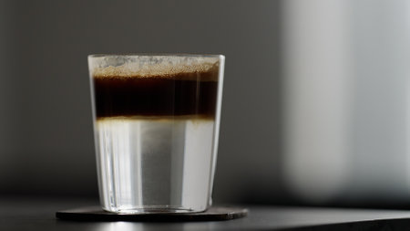 espresso tonic with straw on tableの写真素材