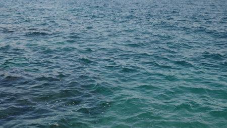 Closeup mediterranean sea background with beautiful azure colorの写真素材