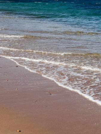 Azure sea coast on South of France with reddish plage