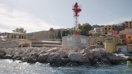 Villefranche-sur-Mer, France, Circa March, 2023: View from a boat of Villefranche-sur-Mer on a sunny dayのeditorial素材