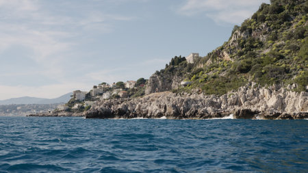 Villefranche-sur-Mer, France, Circa March, 2023: View from a boat of Villefranche-sur-Mer on a sunny dayのeditorial素材