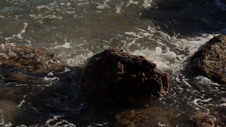 Slow motion of rocks in the sea near Cannesの写真素材