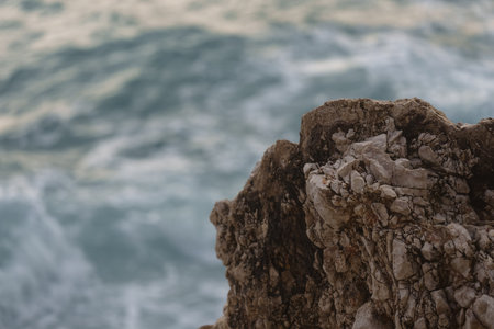 Detail shot of mediterranean rocks with turquoise sea