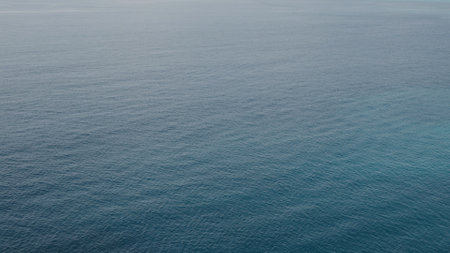 Azure sea surface background from high aboveの写真素材