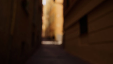 Defocused background of Old city of Nice with vibrant walls and narrow streets