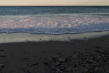 Antibes beach with sunset lightの写真素材