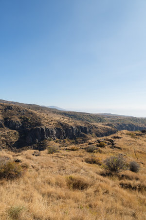 Grass covered mountains and hills in Armenia in autumnの写真素材