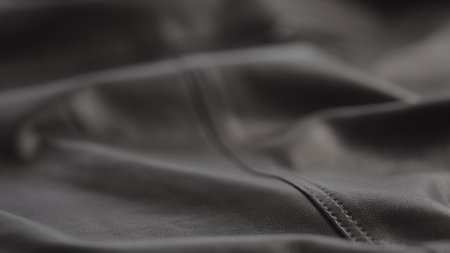 closeup of soft gray brown leather with seamの写真素材