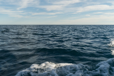 Sea travelling background of empty horizon with sunny weather
