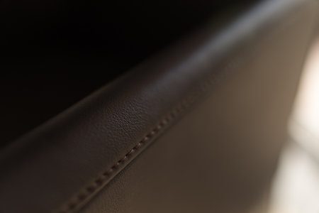 Closeup detail shot of leather chair indoor